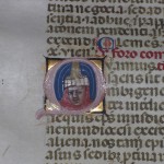 Miniatura in oro blu e rosso